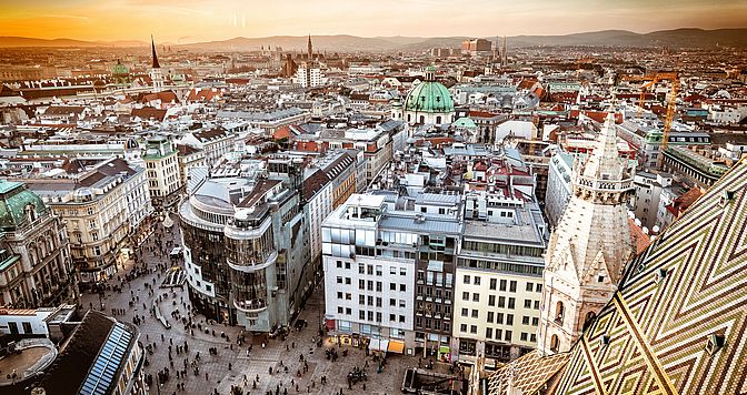 Vienna at sunset, aerial view from above the city